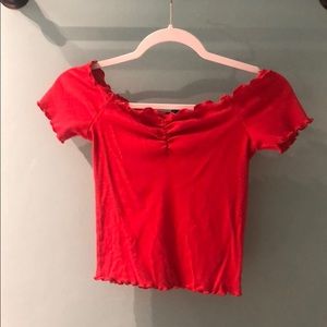 Off the shoulder- short sleeved shirt